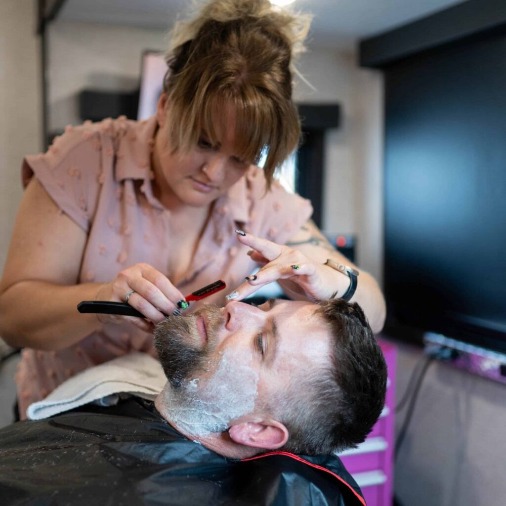 Amber performing men's shave