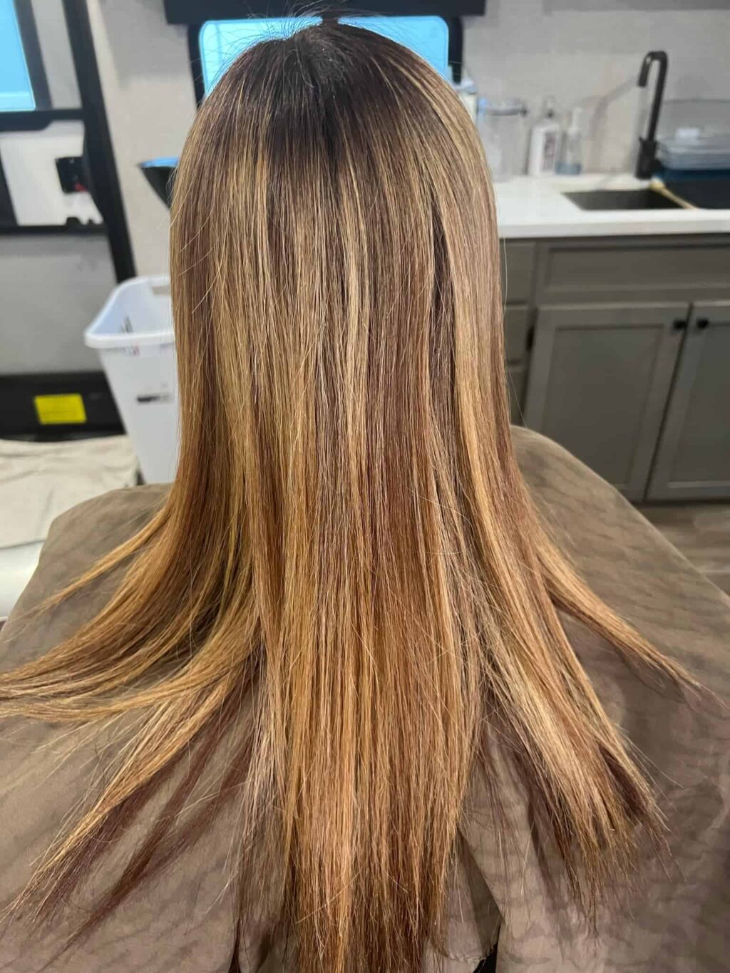 back of a woman's hair with a full highlight