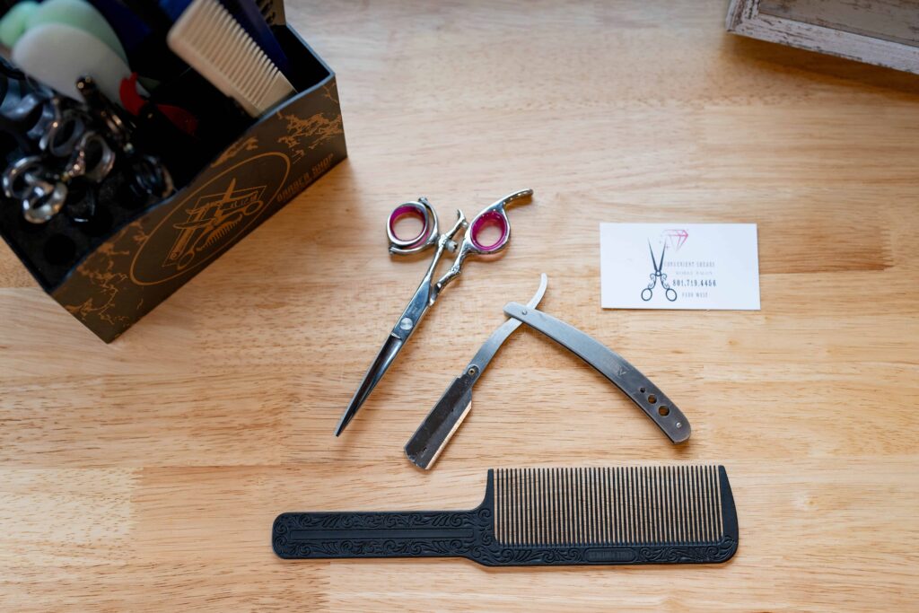 shears and combs lying on a table